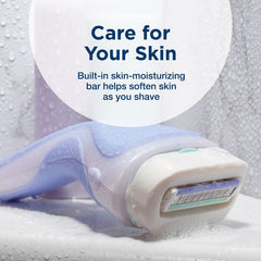 Schick Intuition four-blade refill with pivoting head, contour-hugging shave.