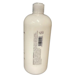 Scottish Fine Soaps Au Lait Hand Lotion close-up reveals creamy texture for nourished hands.