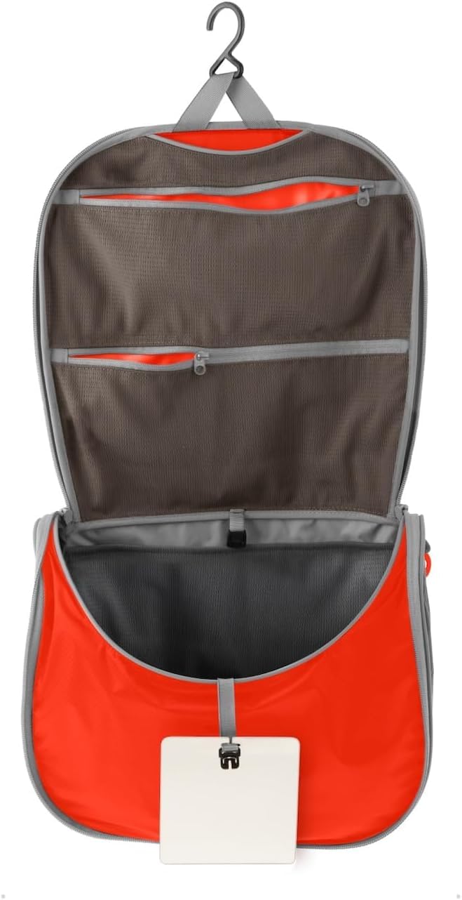 Sea to Summit Small Hanging Toiletry Bag in Spicy Orange, ultralight compact organizer for minimalist trips.