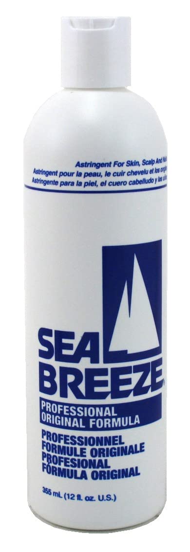 Seabreeze astringent bottle close-up for pre-shampoo oil removal.