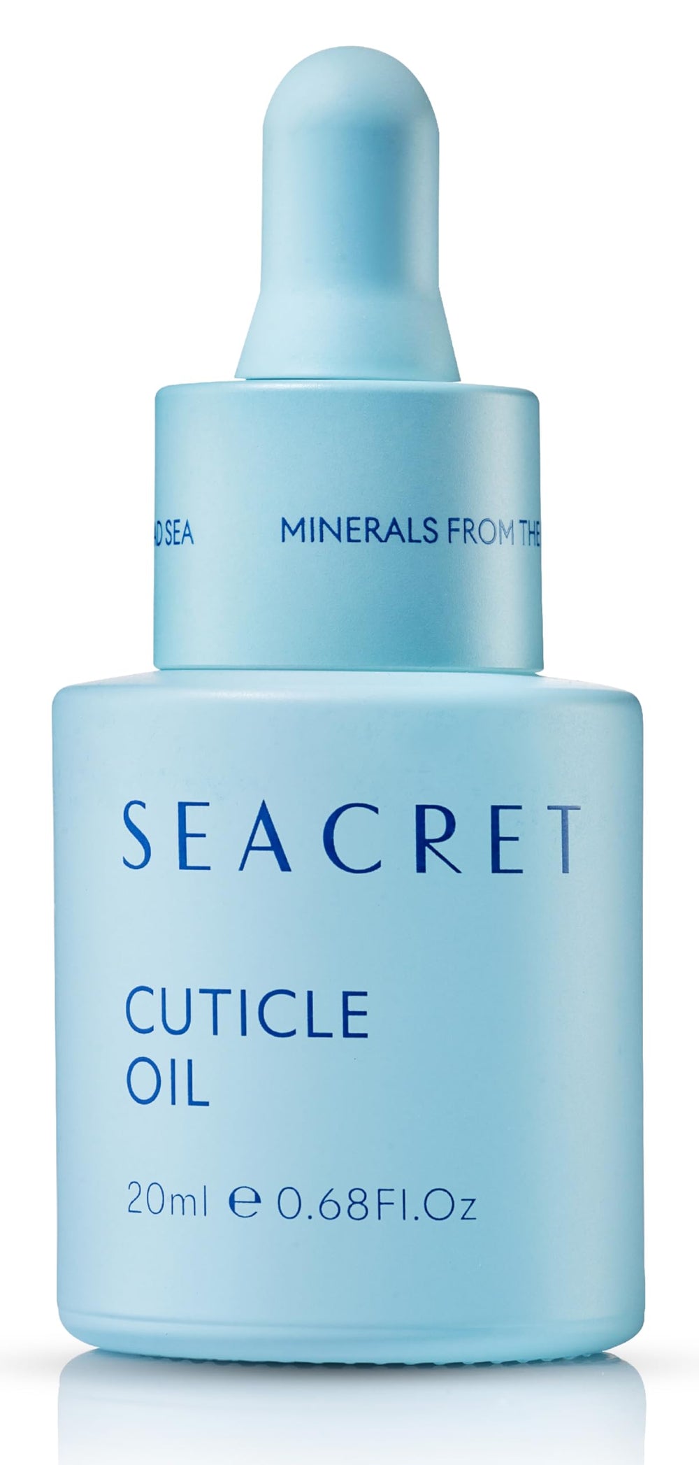 SEACRET cuticle oil close-up bottle reveals oil glow and softens dry cuticles.