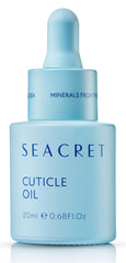 SEACRET cuticle oil close-up bottle reveals oil glow and softens dry cuticles.