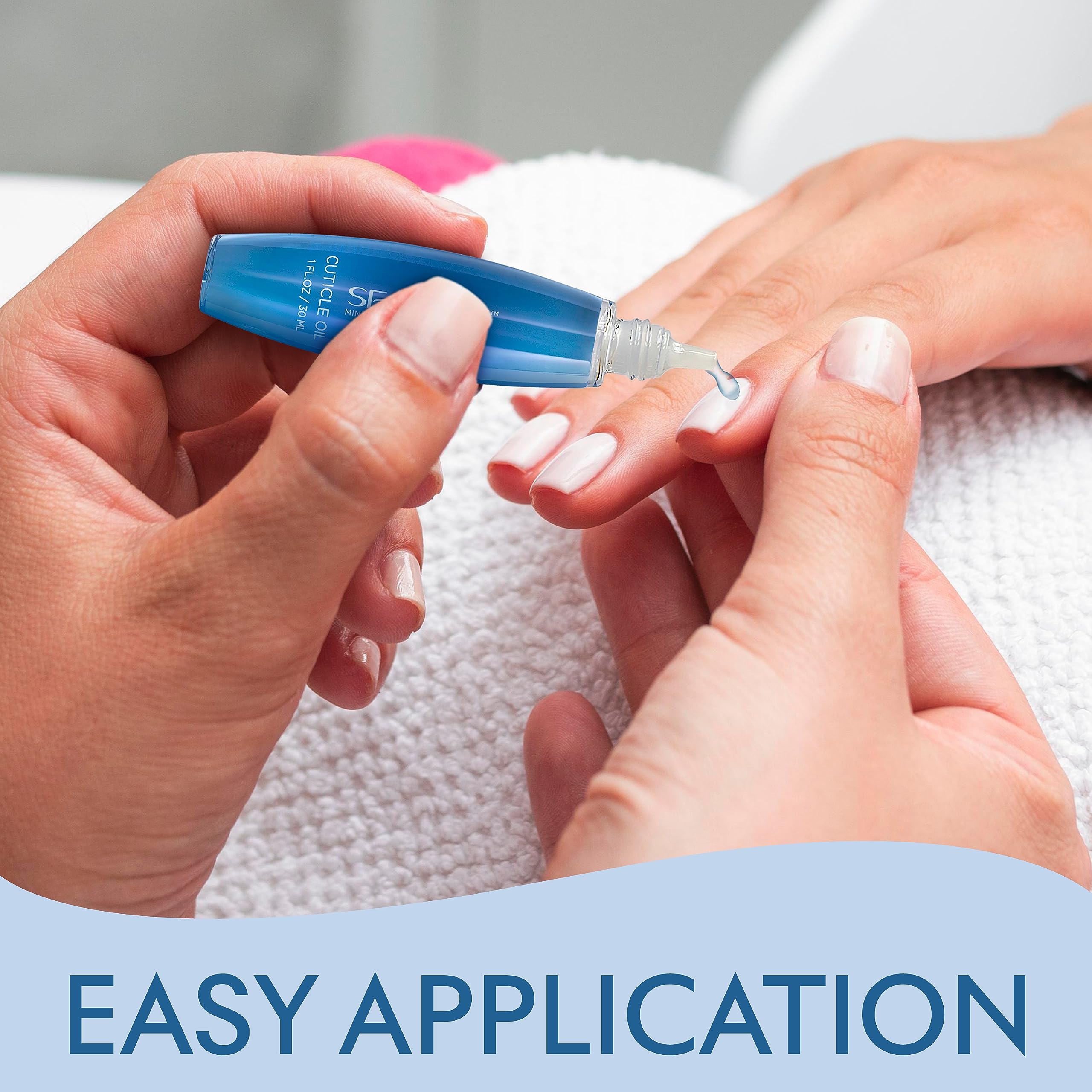 SEACRET bottle pouring natural oils onto nails for quick hydration.