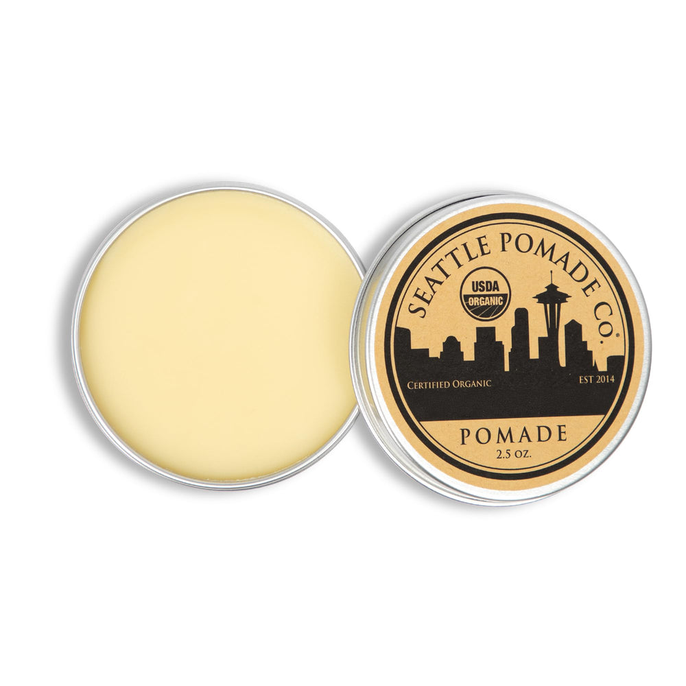 Seattle Pomade Co. shea butter scene demonstrates scalp-moisturizing benefits.