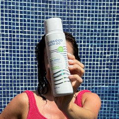 The Seaweed Bath Co. Hydrate Body Wash label closeup highlights vegan, cruelty-free certifications.