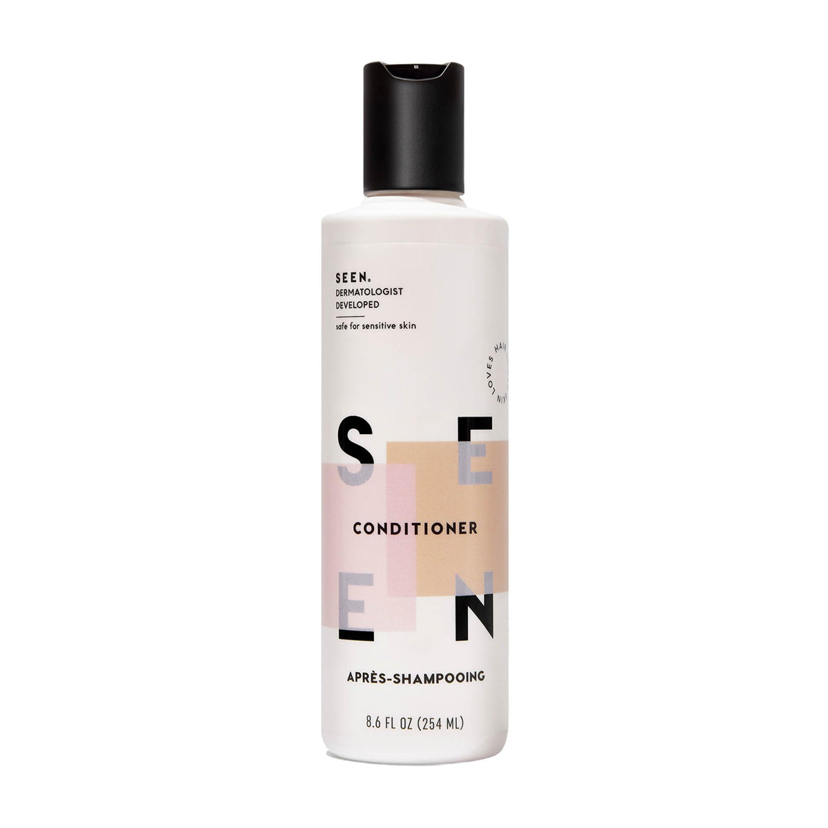 SEEN Conditioner scented bottle close-up shows detangling and smooth hair benefits