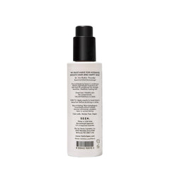 SEEN Leave-In Conditioner being applied to hair demonstrates detangling and smoothing.