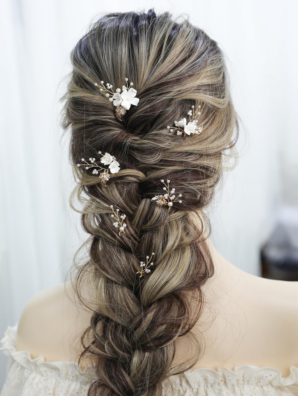 SELFCLOUD gold leaf accents add a touch of timeless glamour to formal hairstyles
