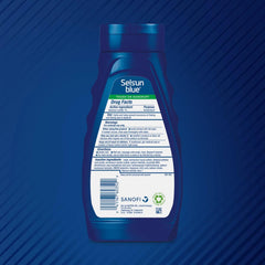 Selsun Blue aloe moisturizing shampoo application on scalp during shower for dandruff relief