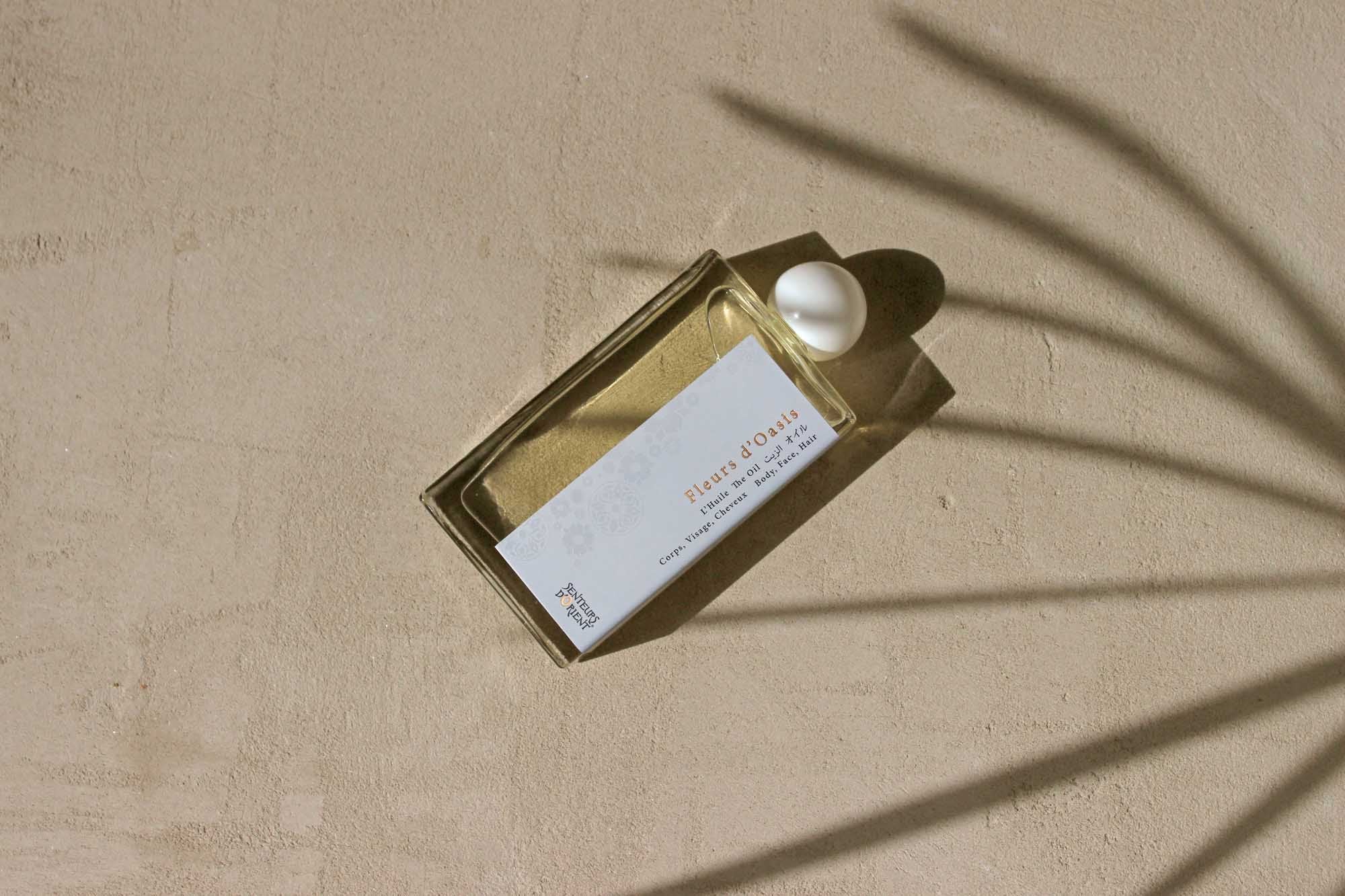 Senteurs d'Orient Fleurs d'Oasis oil use guide shows easy application on skin and hair.