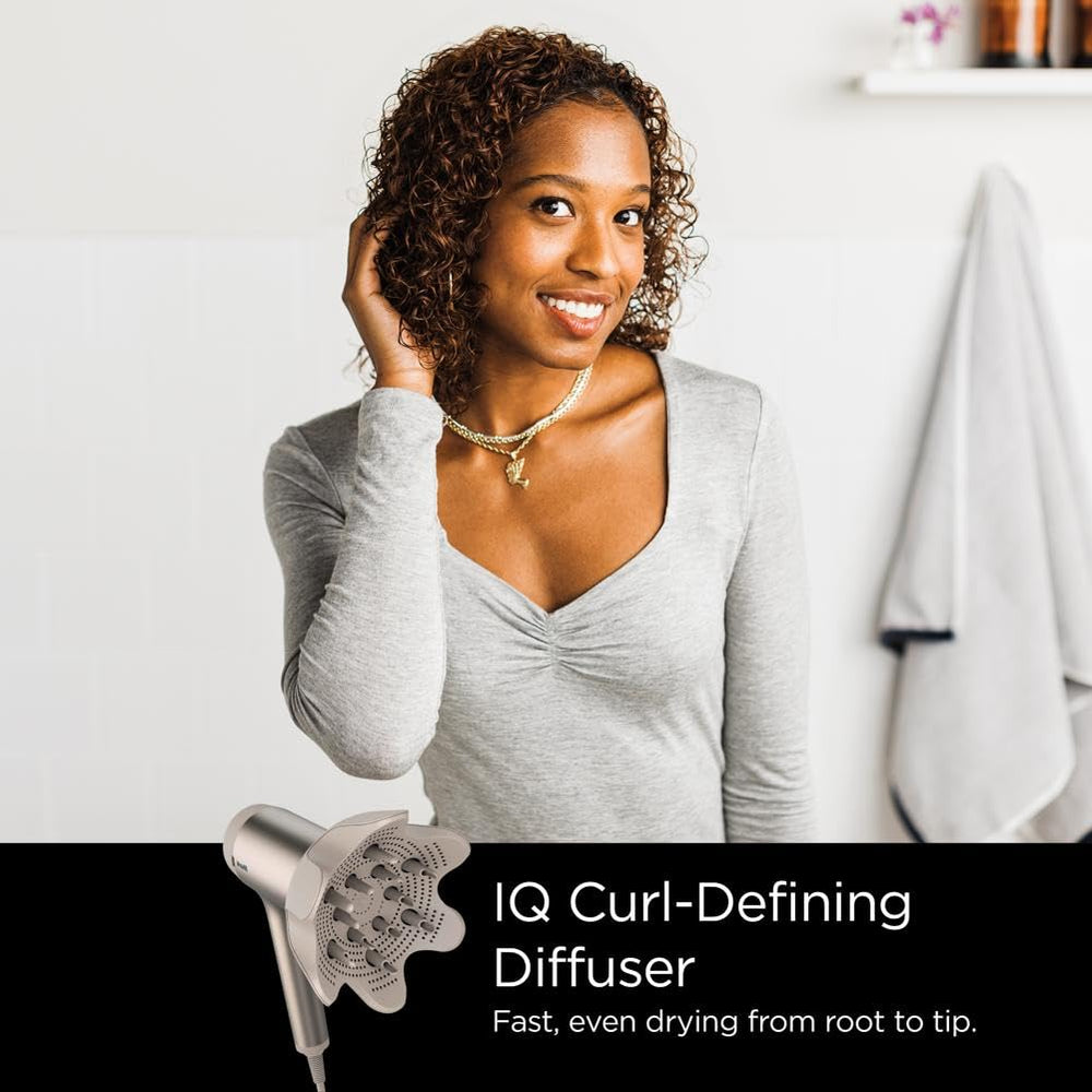 Shark HD120BRN cool shot button detail emphasizes cuticle sealing for smooth results.