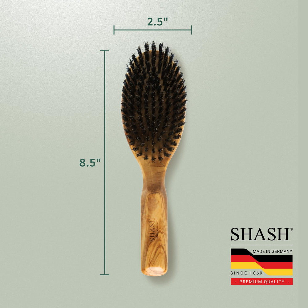 SHASH Everyday brush being cleaned with warm soapy water.