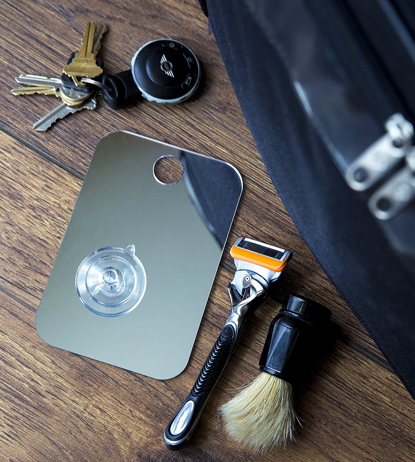 Shave Well travel mirror on tile close-up suction grip for stable use
