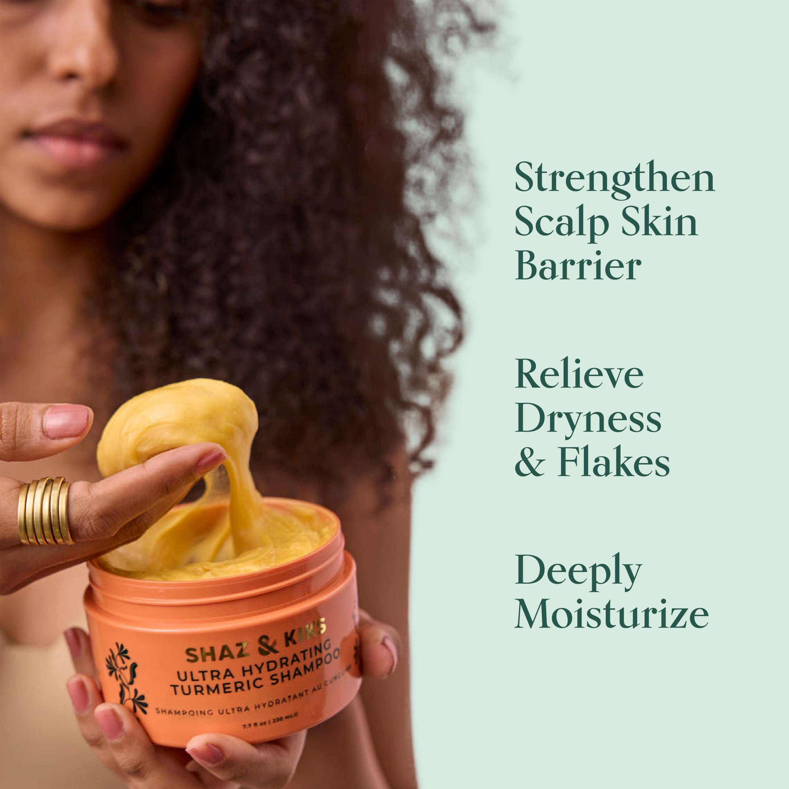 Turmeric root oil closeup from SHAZ KIKS indicating soothing scalp nourishment