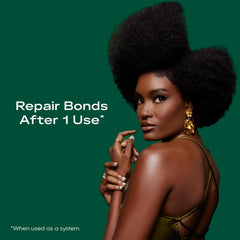 SheaMoisture Bond Repair Shampoo lather close-up shows rich cleansing action.