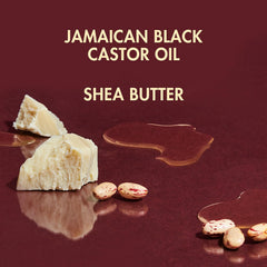 SheaMoisture Jamaican Black Castor Oil clarifying shampoo lather closeup captures creamy texture.