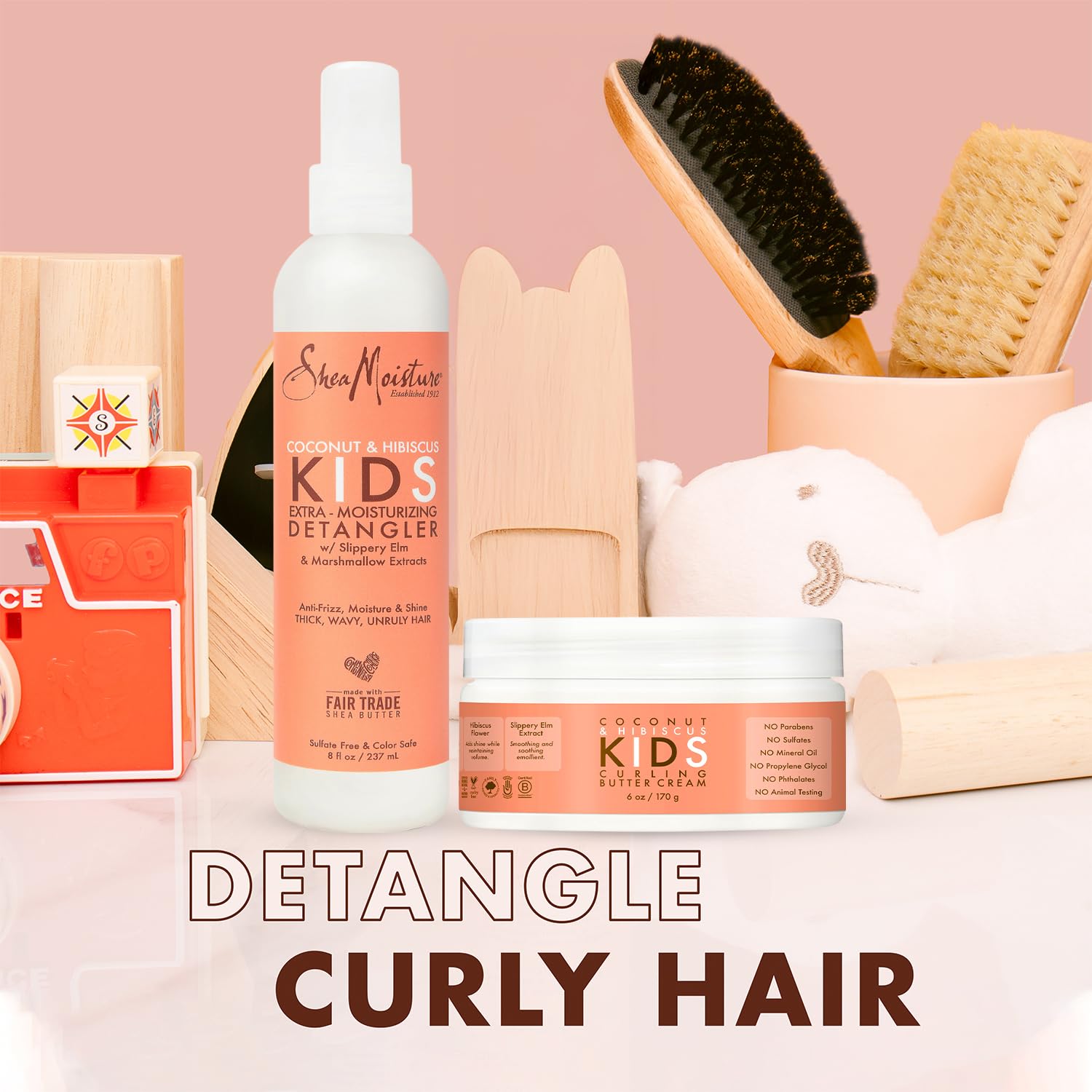 SheaMoisture Kids Coconut Hibiscus Curling Butter Cream showing defined, soft-hold curls.
