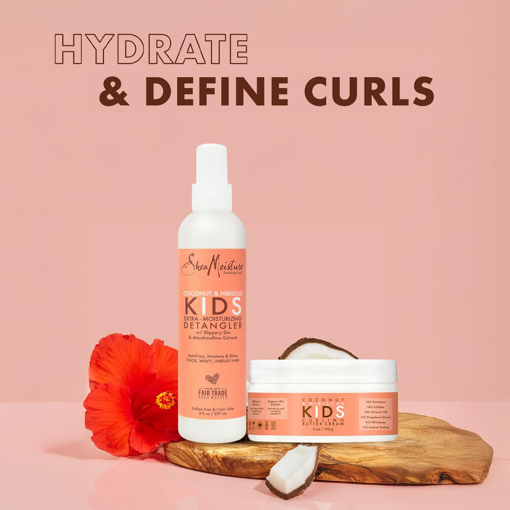 SheaMoisture Kids Curl Cream smoothing damp hair for frizz control.