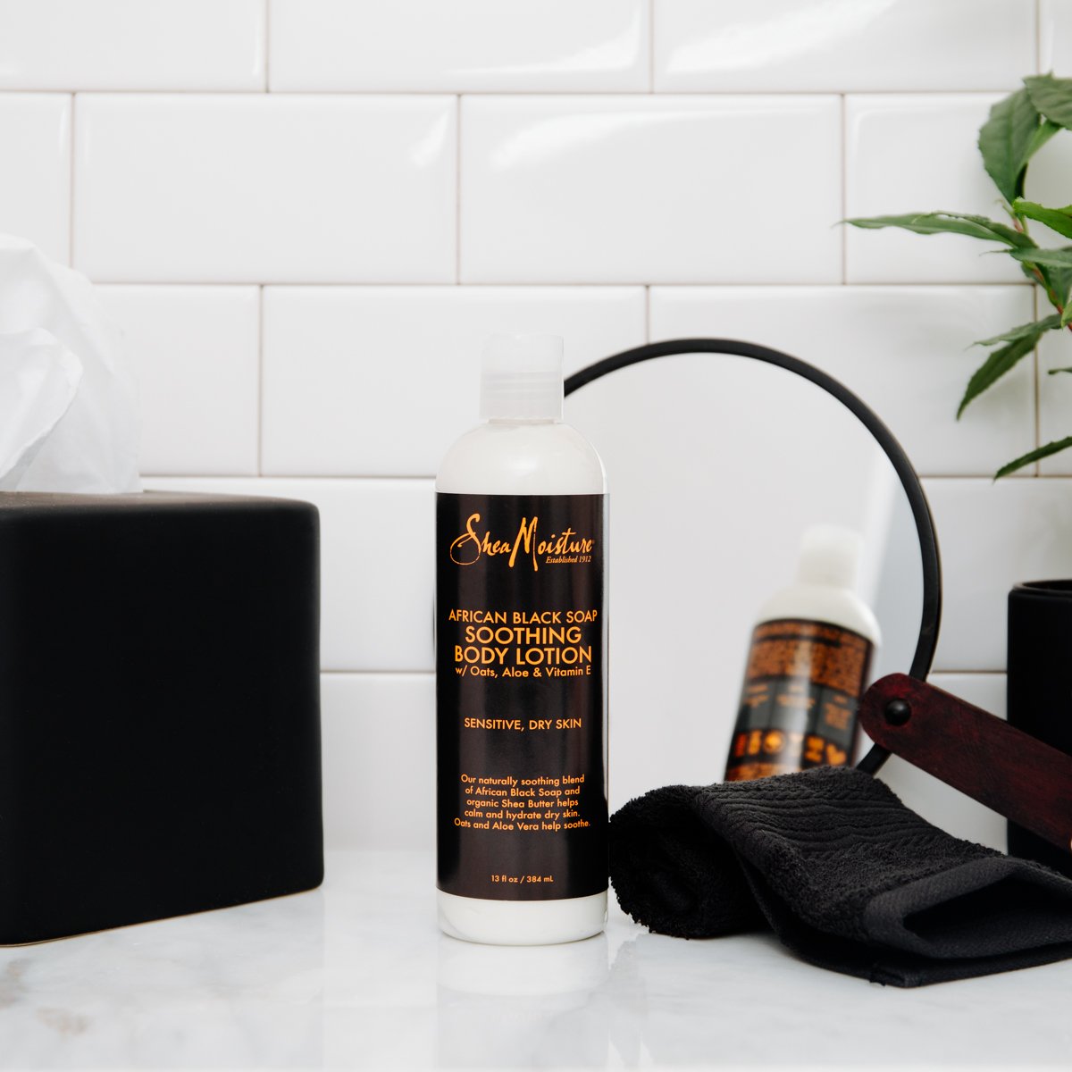 Lotion container focused on the shea butter ingredient