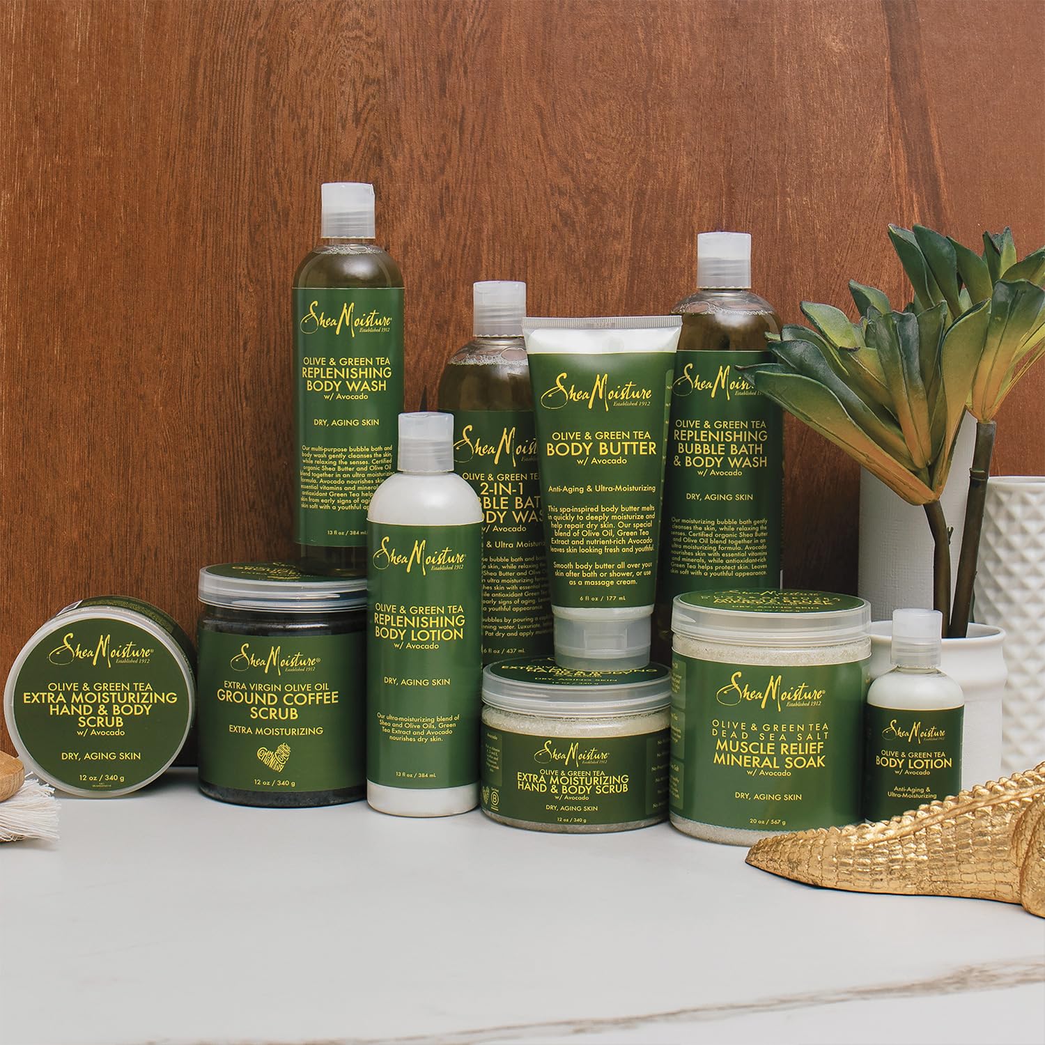 SheaMoisture Massage oil in hands ready for relaxing sessions