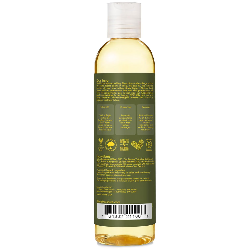 SheaMoisture Olive & Green Tea bath oil pour showing massage-friendly texture
