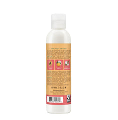 SheaMoisture Papaya Neroli Milk Gel damp hair application shows easy root-to-tip coverage.