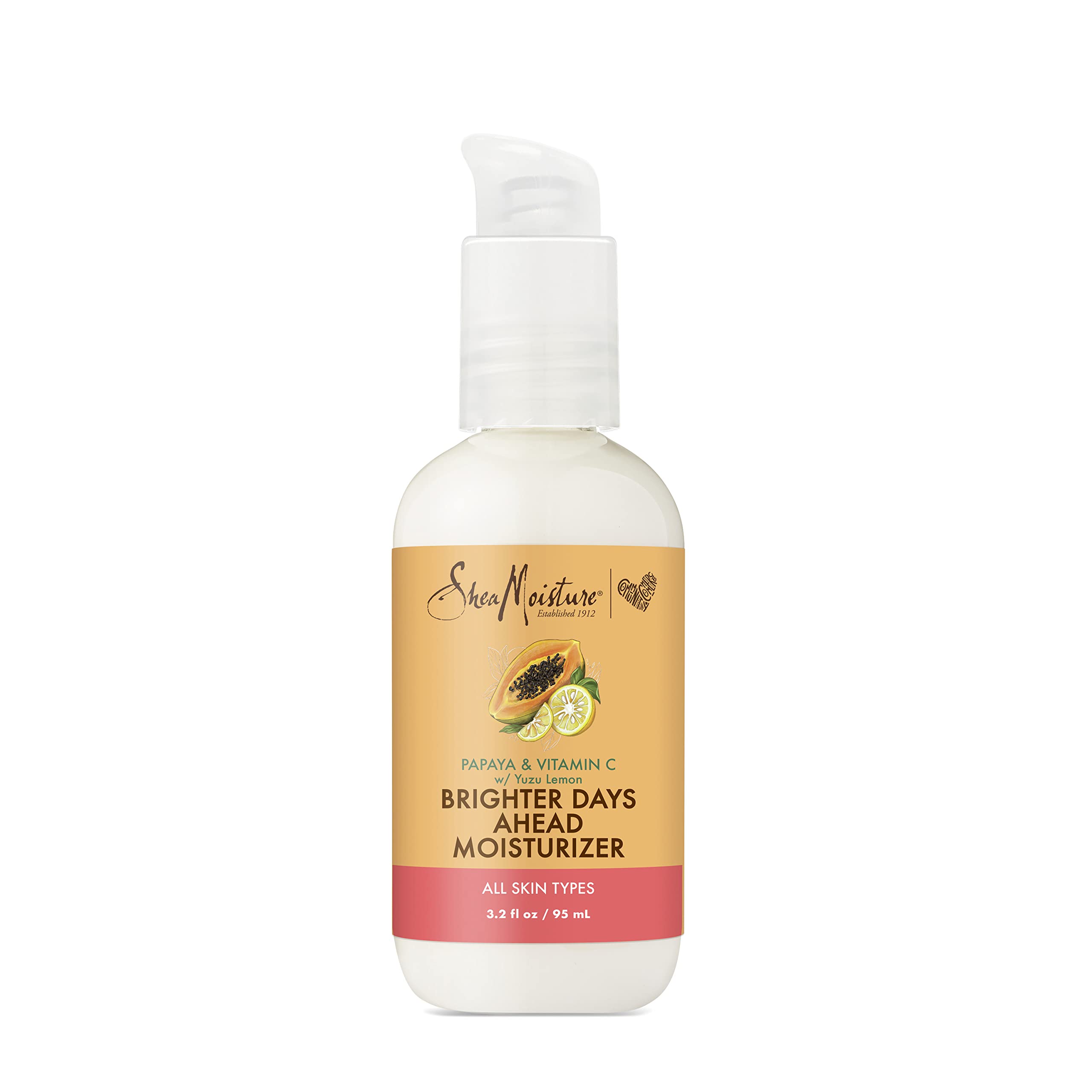 SheaMoisture Papaya Vitamin C moisturizer bottle on vanity for radiant skin.