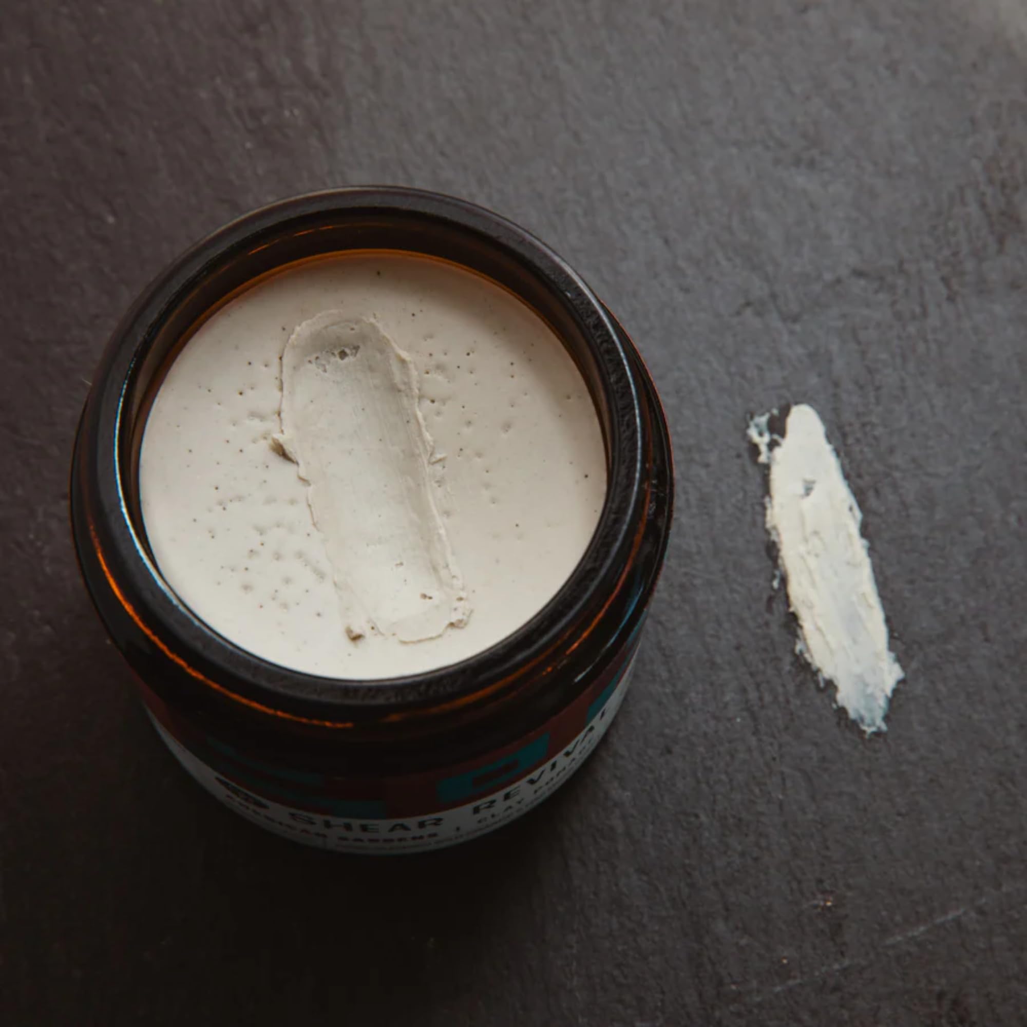 American Gardens pomade on textured hair for defined, matte styling