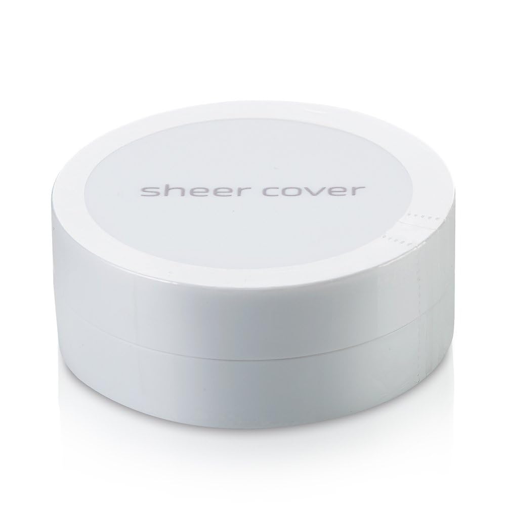 Sheer Cover airbrushed-look mineral powder application closeup highlights light-reflecting finish