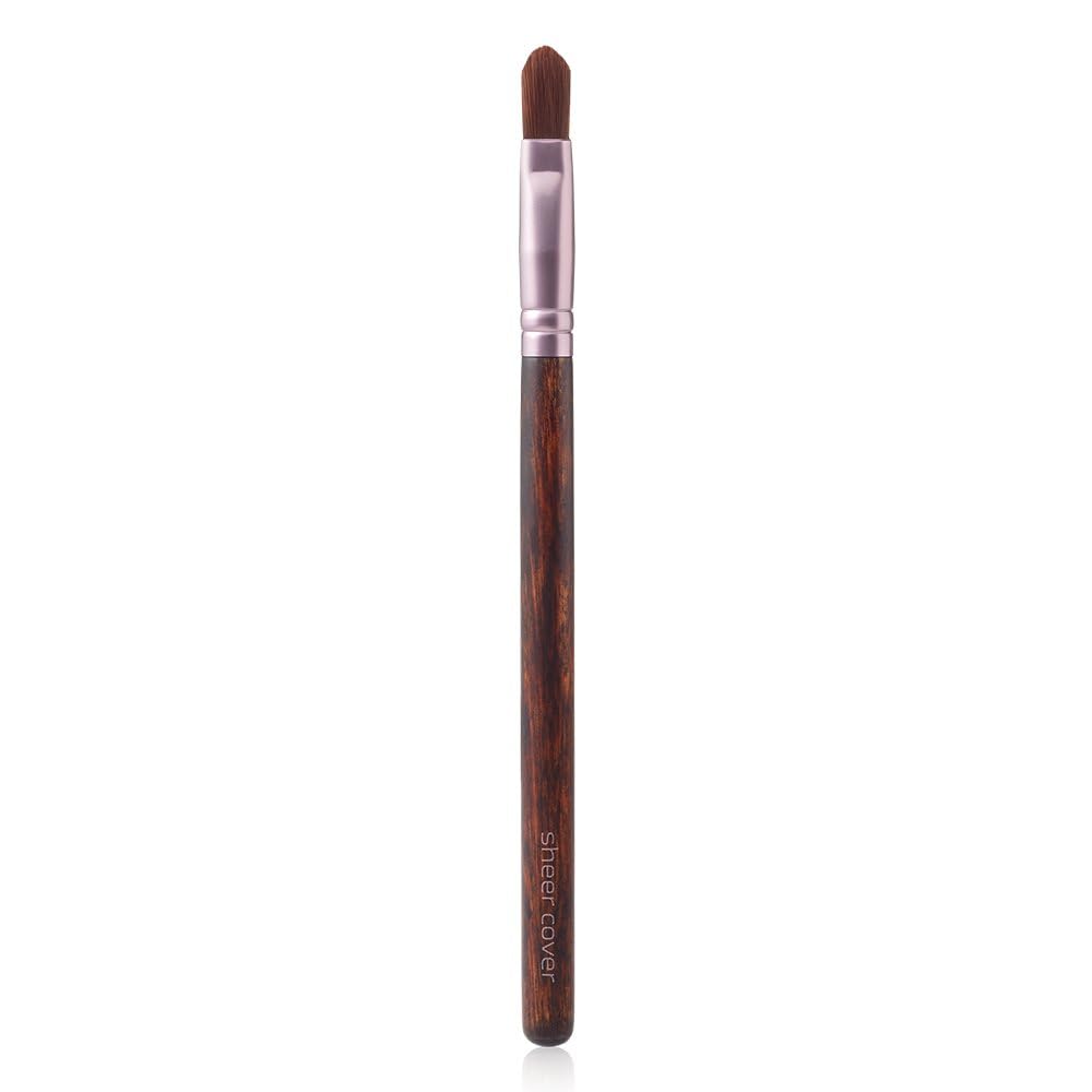 Sheer Cover Studio cheekbone glow application demonstrates subtle luminous highlight.