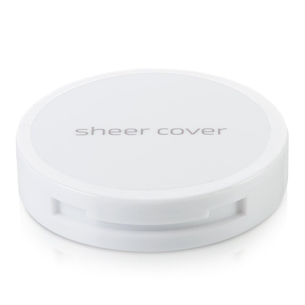 Sheer Cover Studio open compact shows concealers and brightener for precise conceal and brighten.