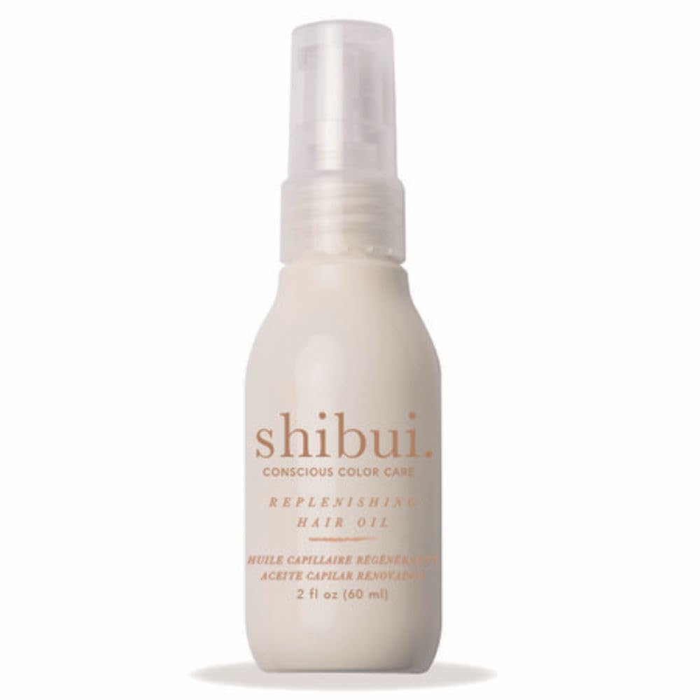 SHIBUI Replenishing Hair Oil bottle pour shows easy hydration and frizz control.