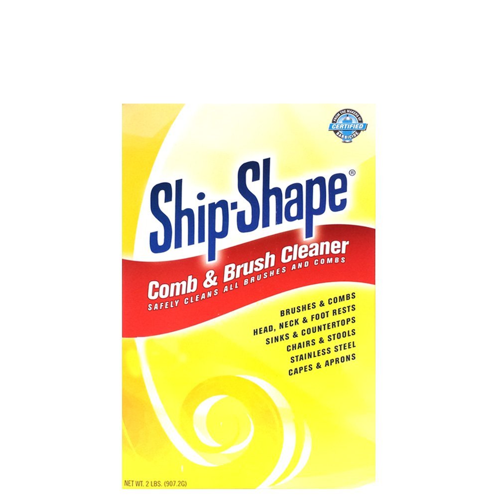 Ship-Shape Comb and Brush Cleaner bottle on counter, removing buildup for quicker brush refresh.
