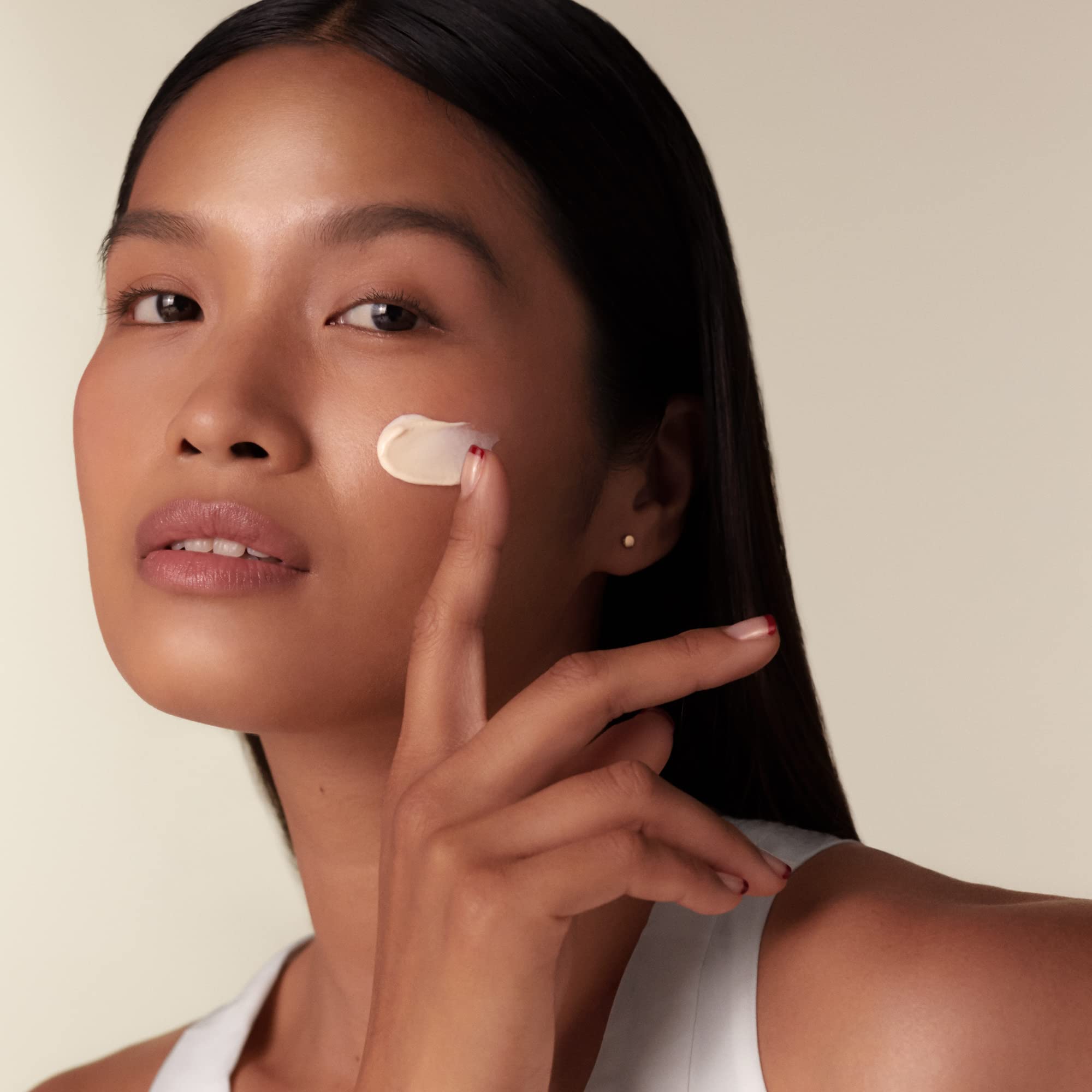 Shiseido Benefiance day-cream texture close-up shows luxurious, smoothing finish.