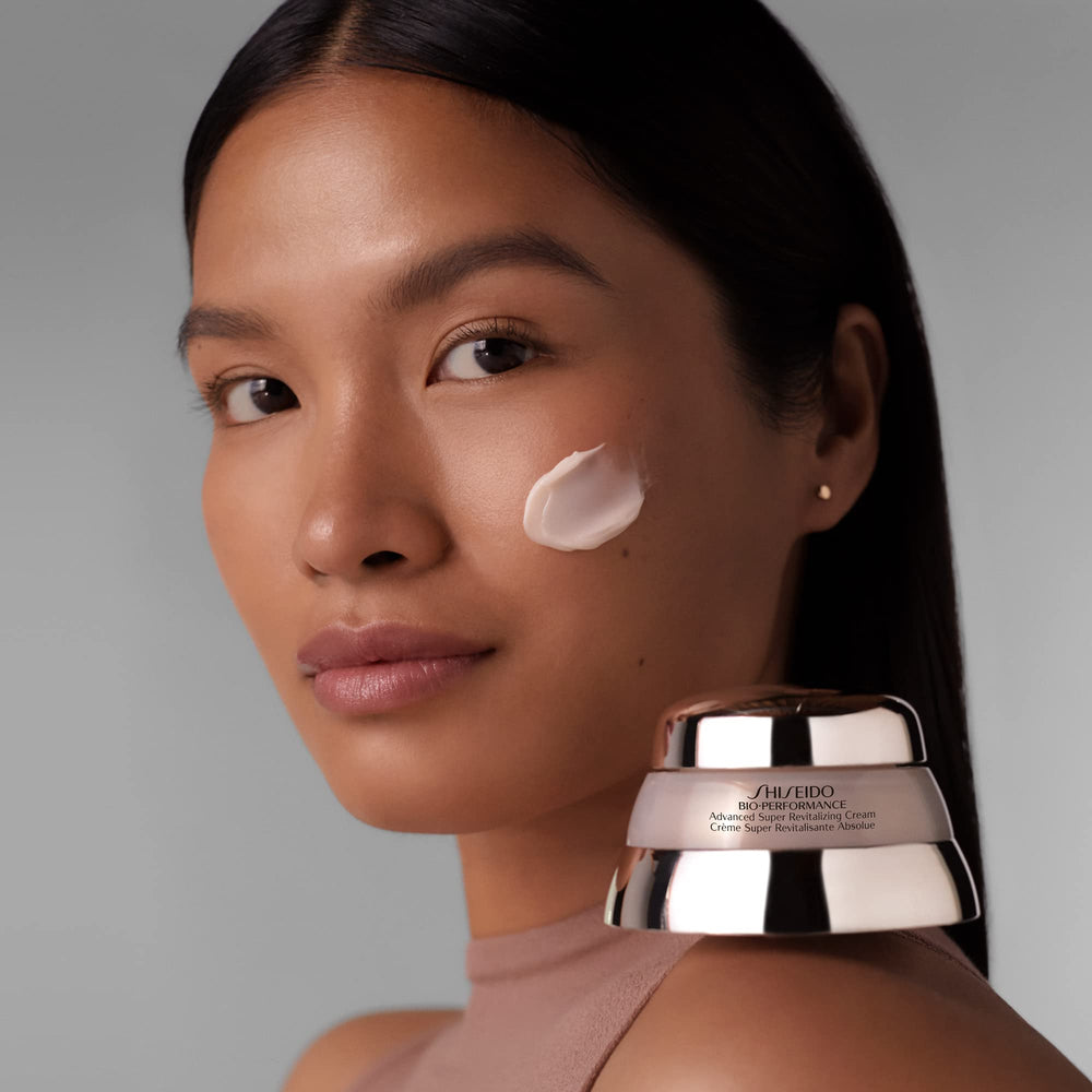 Shiseido Bio-Performance glass jar with soft lighting conveys luxury skincare ritual