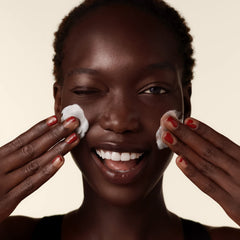 Shiseido Clarifying Cleansing Foam texture closeup highlighting rich lather.