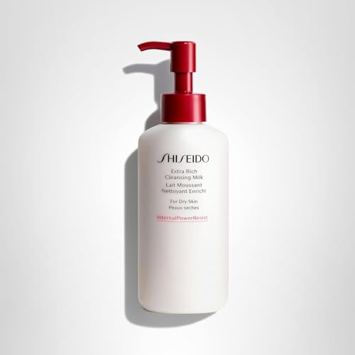 Shiseido Extra Rich Cleansing Milk bottle on sink for calm daily skincare ritual.
