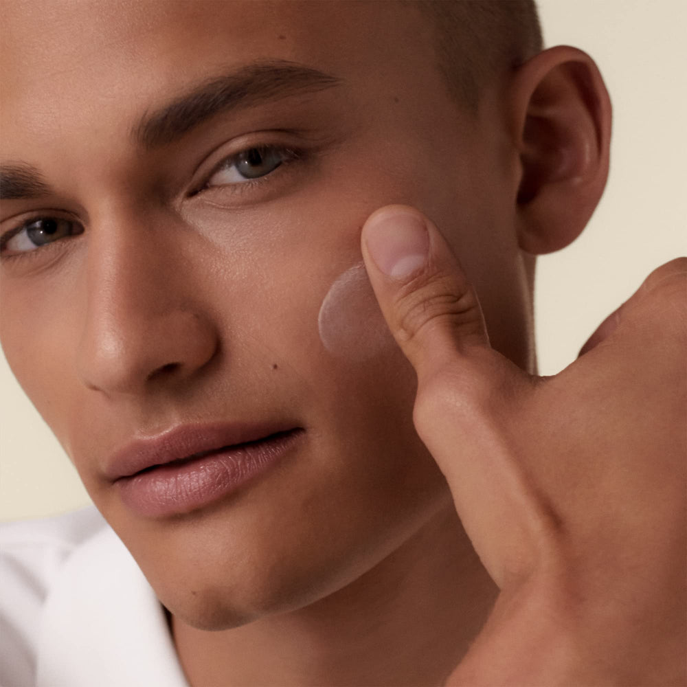 Shiseido Urban Environment primer-ready layer image shows smooth skin prep.