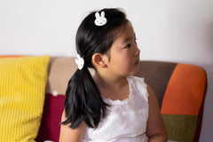 SHOBIDO Miffy die-cut bangs clip close-up shows smooth edge design for gentle use.