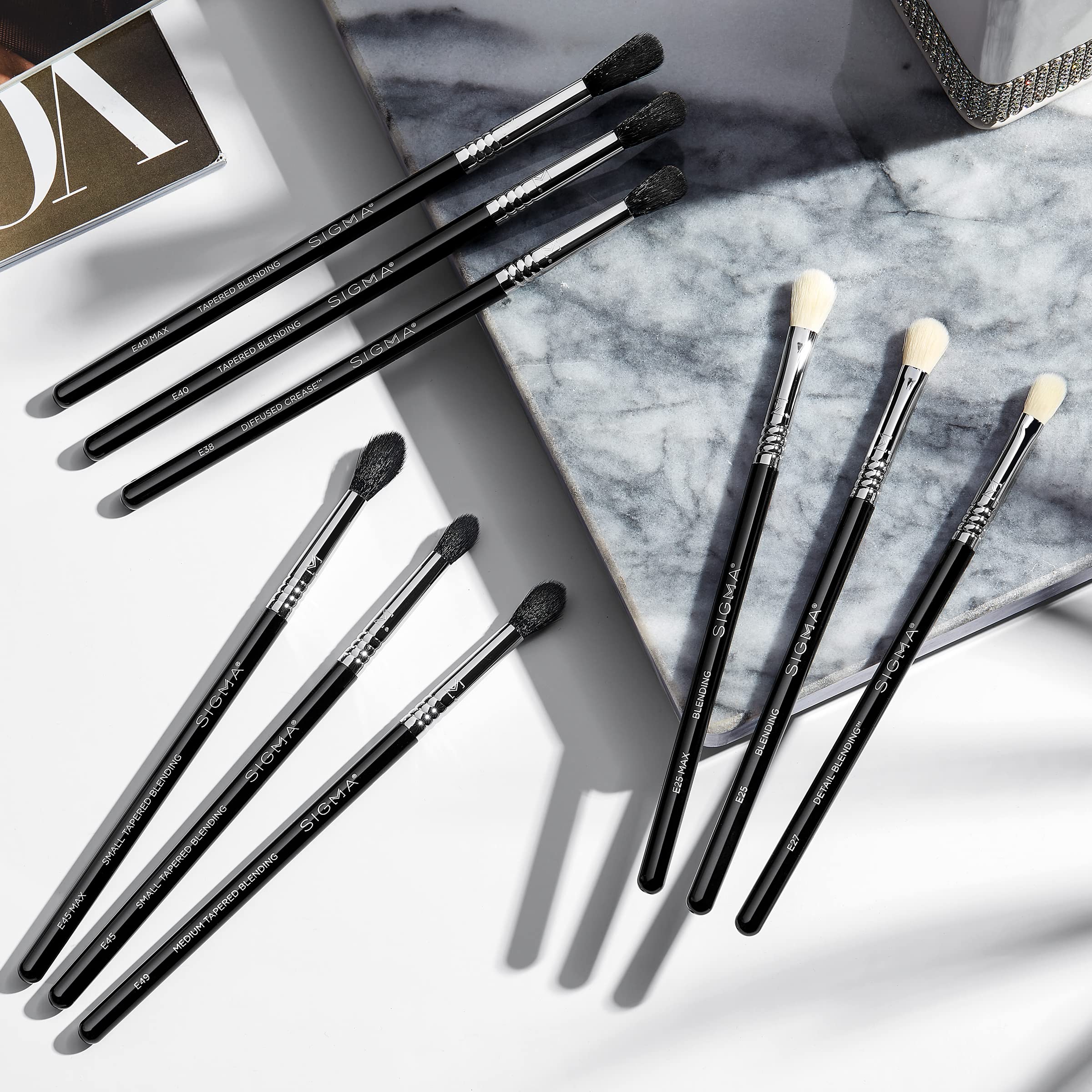 Sigma Beauty E45 brush designed for hooded eyes with precise blending on the outer corner.