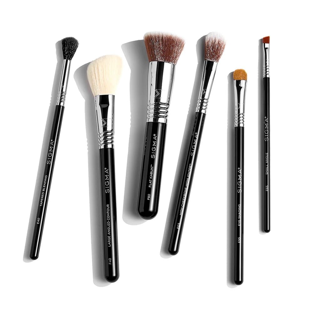 Sigma Beauty E55 used with powder eyeshadow for buildable coverage and depth.
