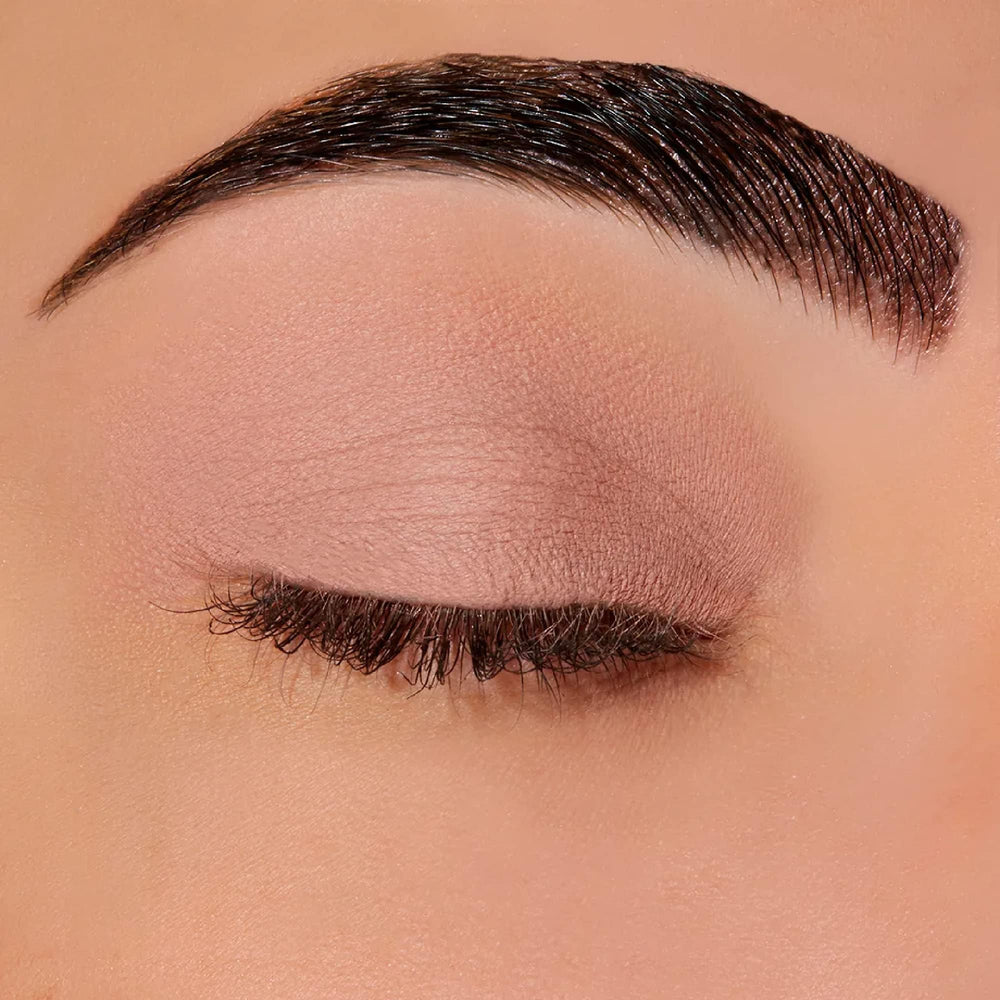 Sigma Beauty Eyeshadow Primer Base application stroke showing smooth priming