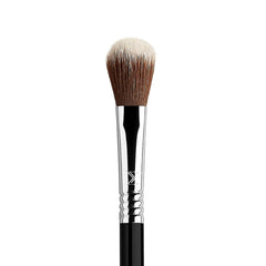 Sigma Beauty F03 brush buffing along the cheekbone for radiant definition