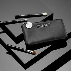 Sigma Beauty Glam ’N Glow E30 mini pencil brush for precise inner corner work.