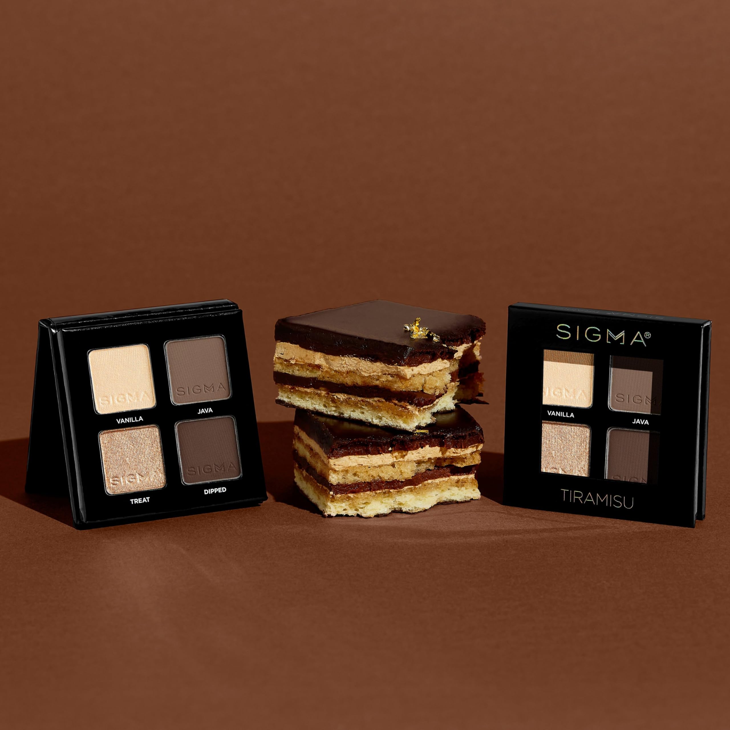 Sigma Beauty Quad Eyeshadow Tiramisu shimmer shade catches light for a glow.