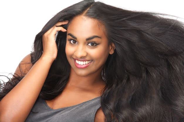 Simply Stylin' Light Silk Spray Unscented being applied to hair for straightening prep