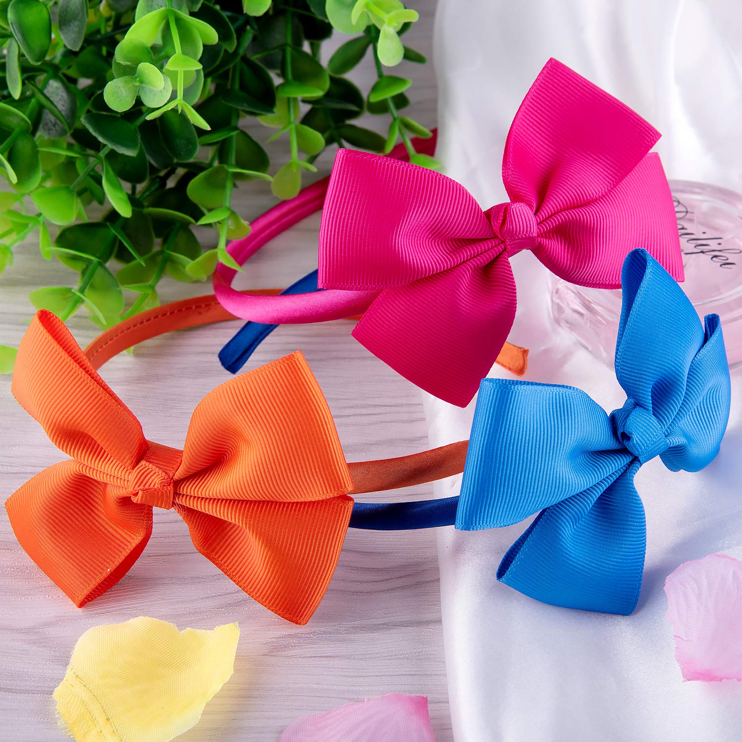 SIQUK bow headbands 13.5cm height provides secure hold.