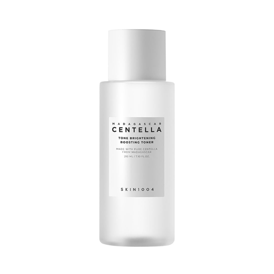 SKIN1004 Tone Glowing Toner applied with cotton pad for gentle exfoliation