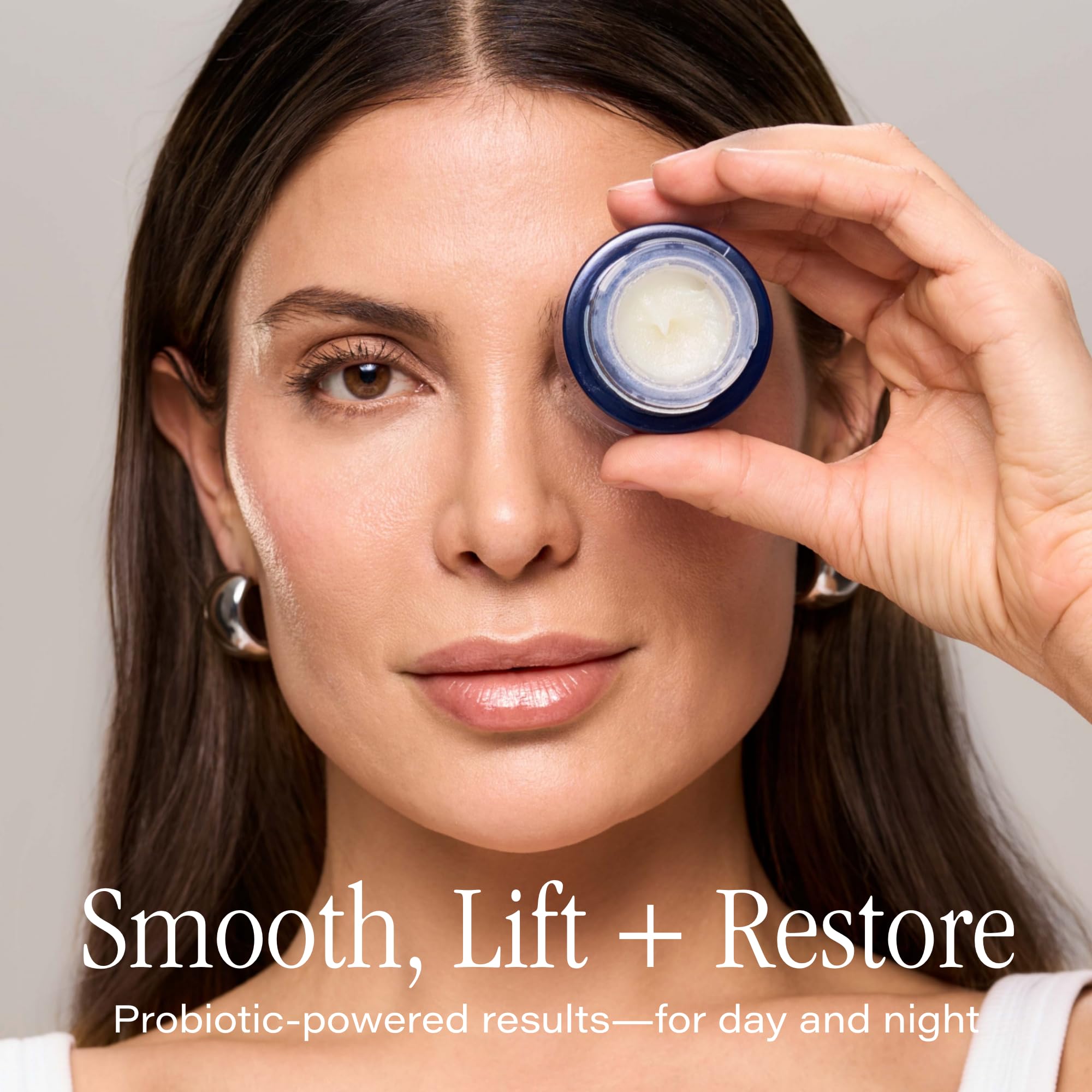 SKINN Age Reset Eye Balm Probiolift application demonstrates gentle eye-area massage.