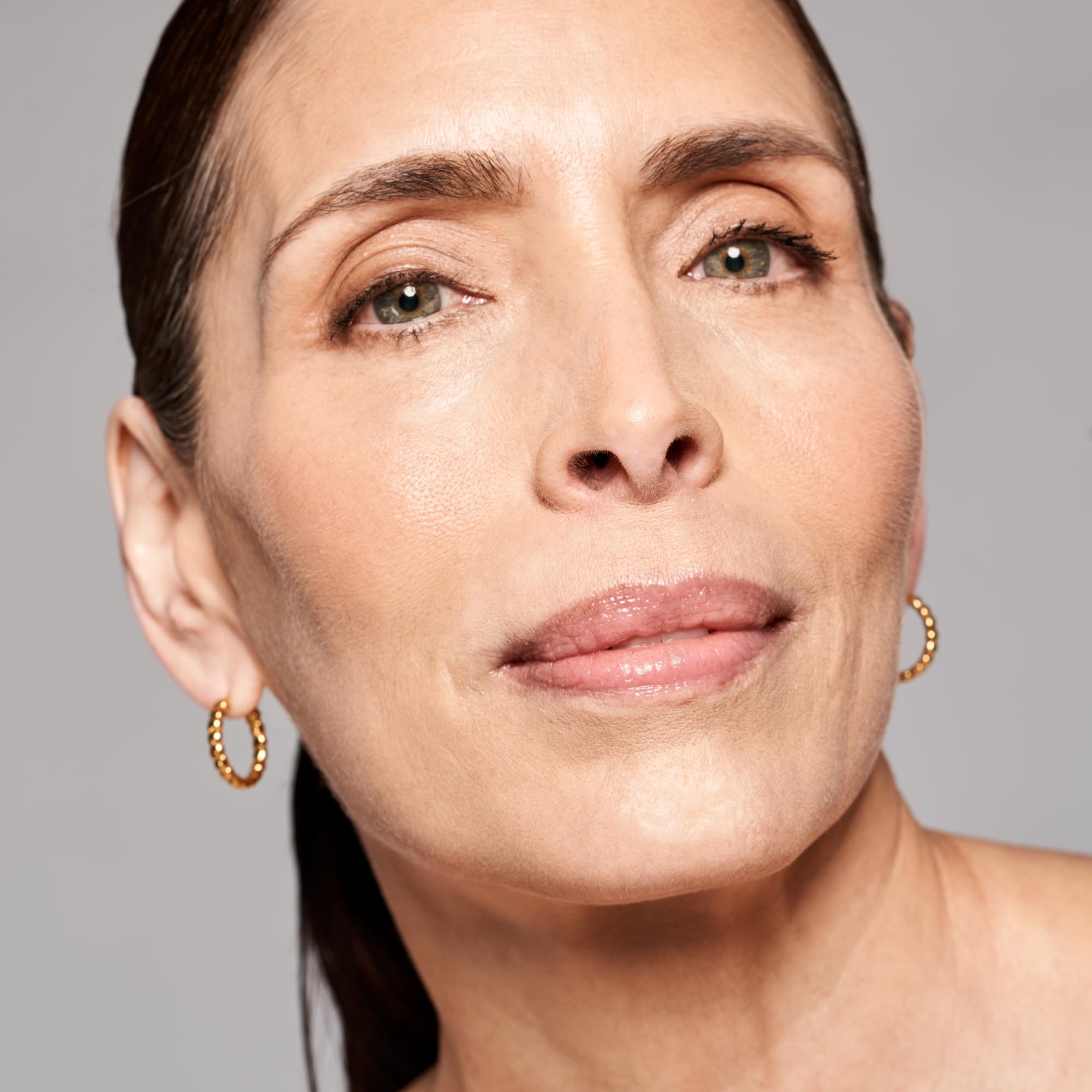 SKINN Deep Wrinkle Serum NAD infusion visual suggests energized skin repair
